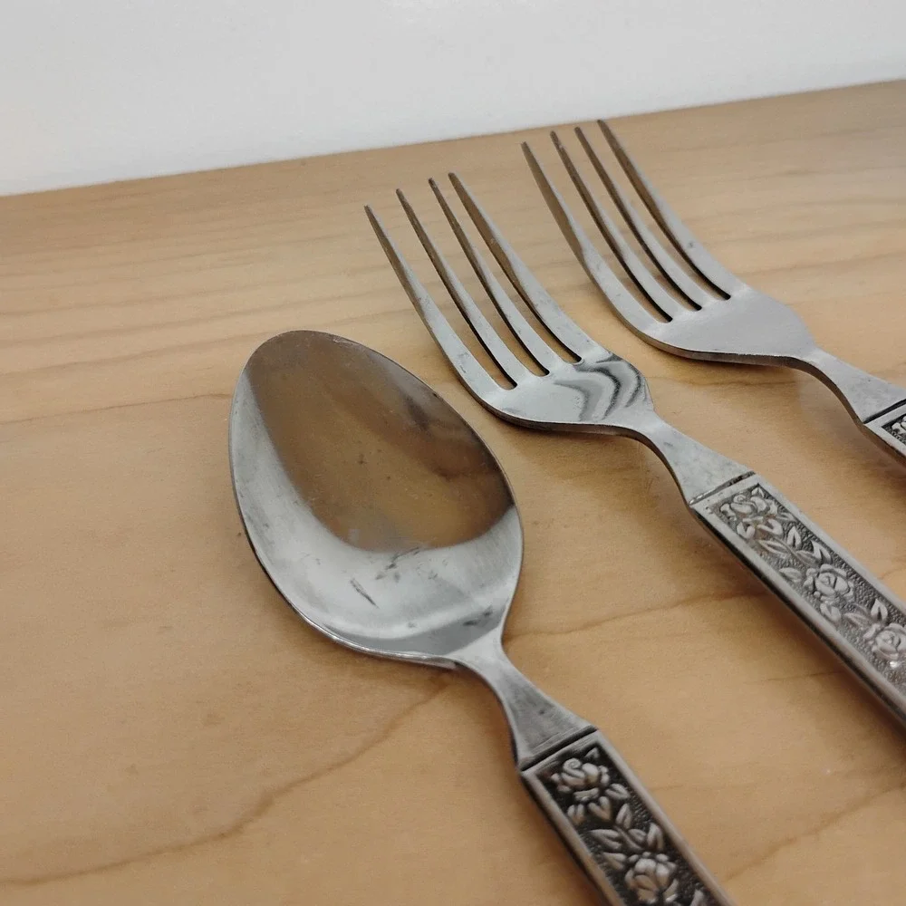 NST18 (STAINLESS)‎ by National Stainless 2 Forks & Spoon Roses, Black Accent